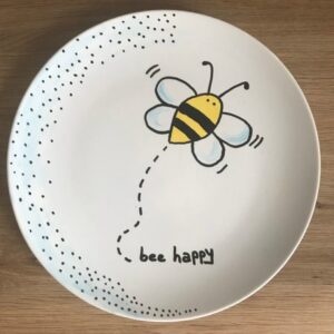 bord met afbeelding bij (bee happy)