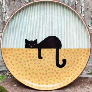 bord me slapende poes